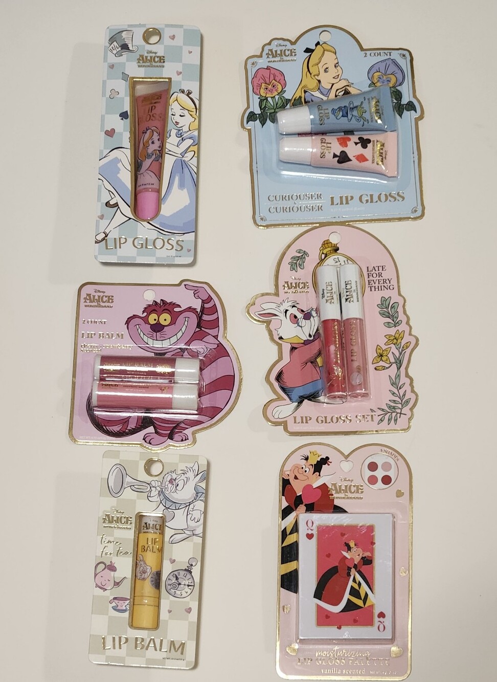 Collection Of 6 Disney × Enchante Alice in Wonderland Lip Gloss & Balm